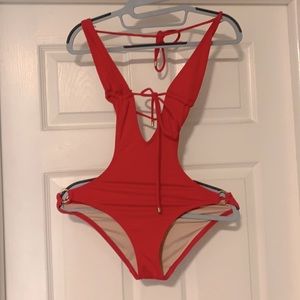 Victoria secret cut out one piece.
